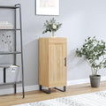 Ein Metallgestell ergaenzt das Sideboard aus Holzwerkstoff