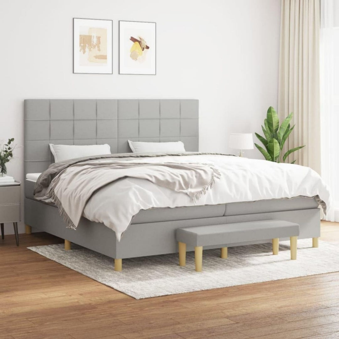 Boxspringbett in Hellgrau mit einem Taschenfederkern